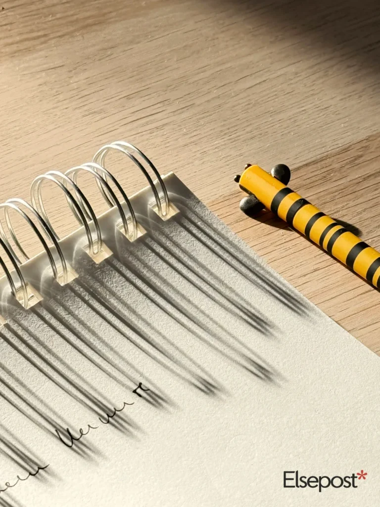 Notebook and pen on a wooden desk for the 1 November rule changes checklist