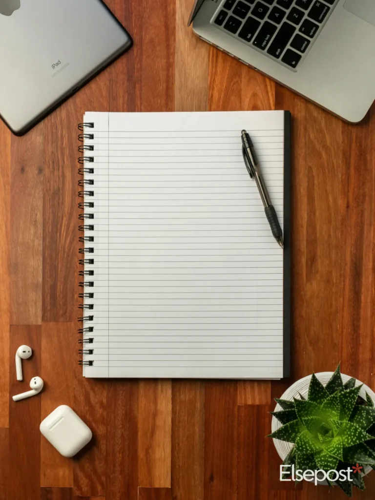Black pen on a white notebook, for filing a consumer complaint