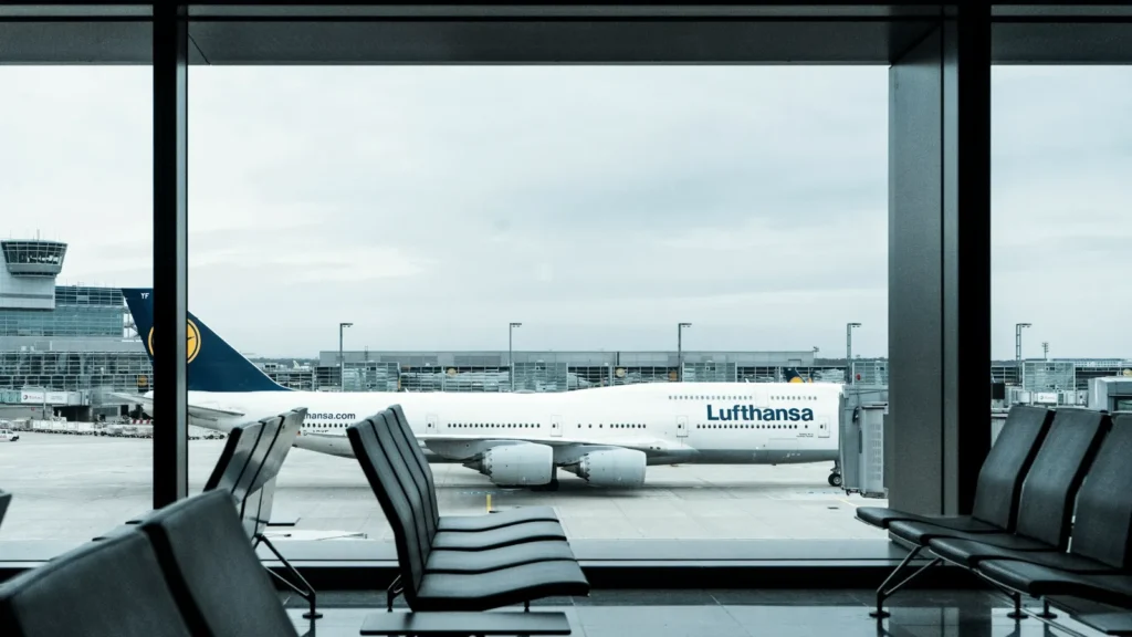 Rows of empty airport seats in daylight, illustrating DigiYatra international flights