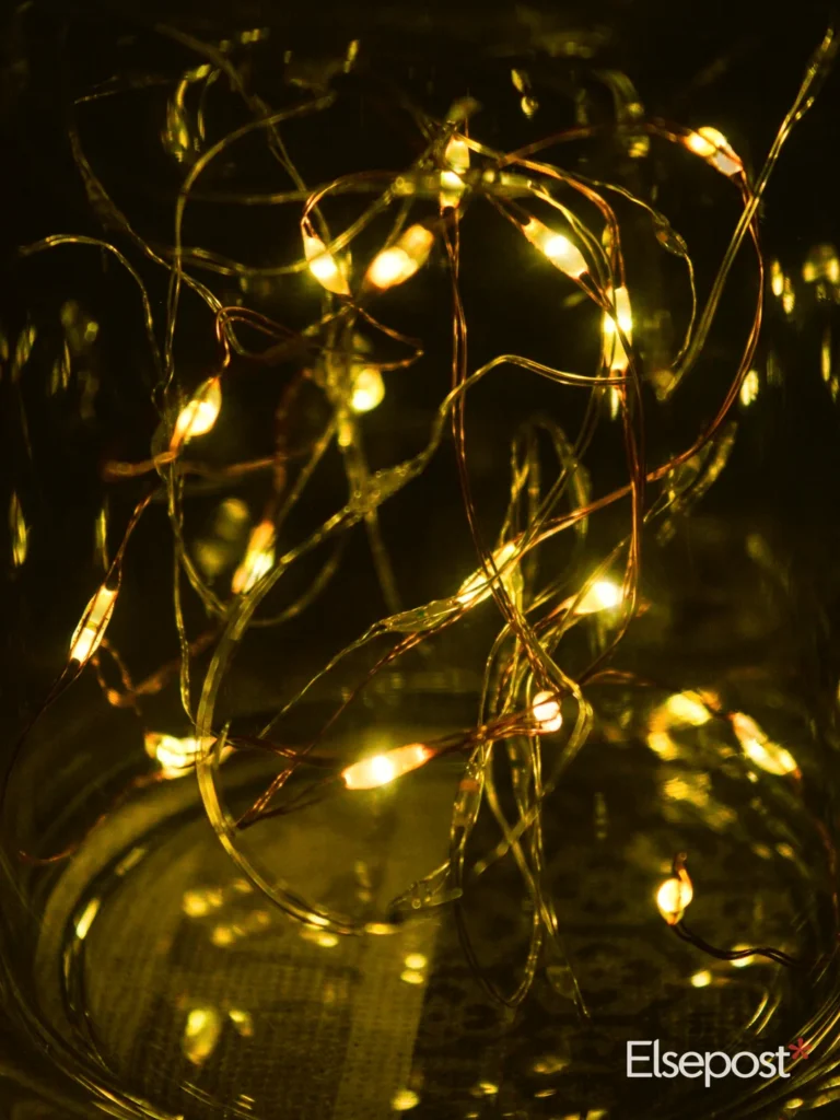 Warm yellow LED string lights glowing in the dark, a common Diwali decoration for the home
