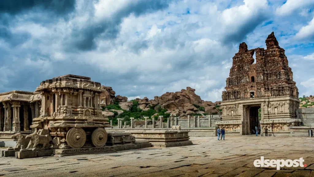 Stone temple structures among boulders at Hampi