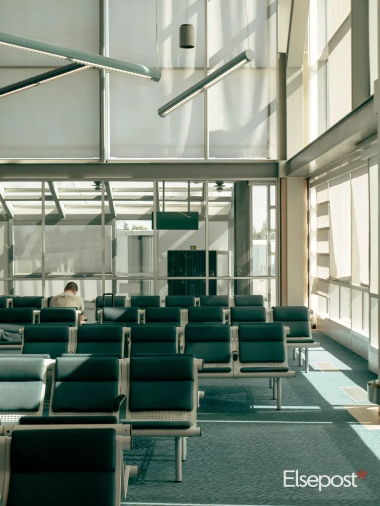 Navi Mumbai airport flights: Bright airport waiting area with empty seats and sunlight
