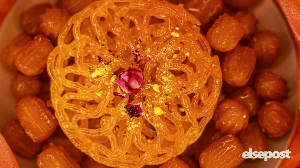 Golden jalebi and fried sweets on a plate, illustrating loose sweets best before date