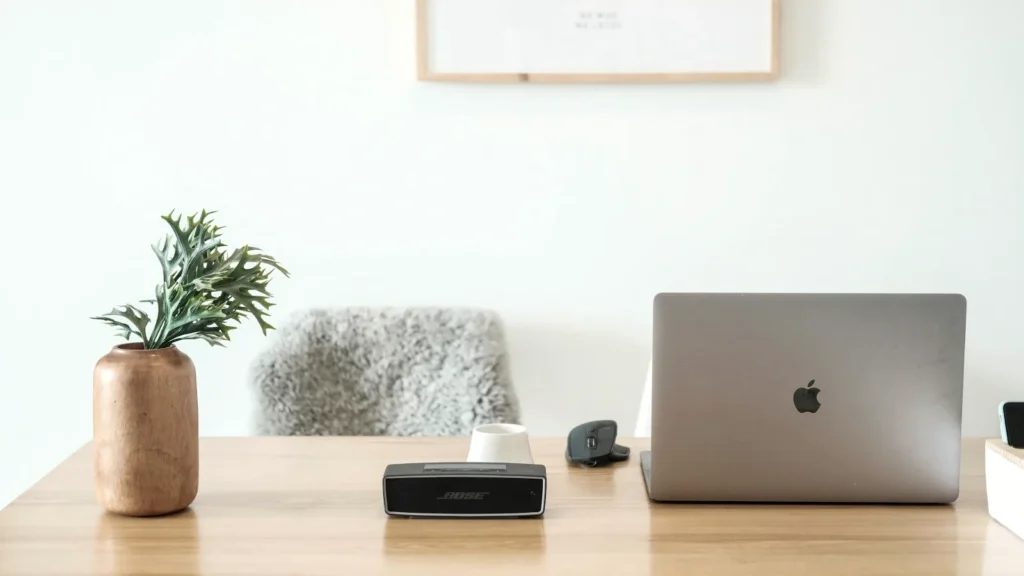 A MacBook Pro on a wooden table, illustrating MacBook Pro M6 price in India