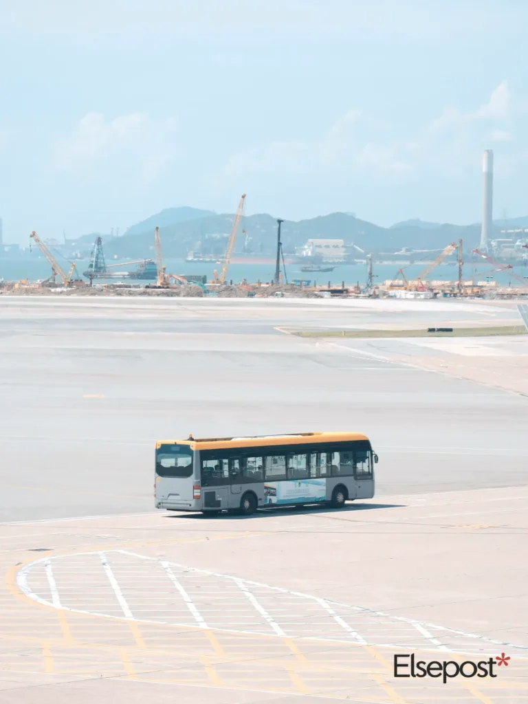 bus parked in a lot for Navi Mumbai Airport Transport