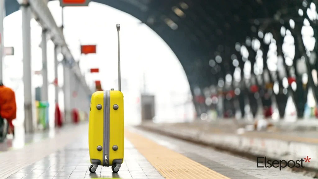 Yellow suitcase on a tiled floor, for the railway luggage limit guide