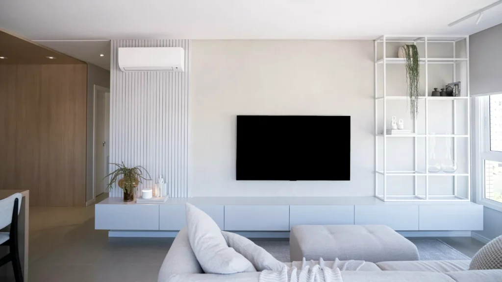 A bright living room with a large television, illustrating TRAI live TV apps rules